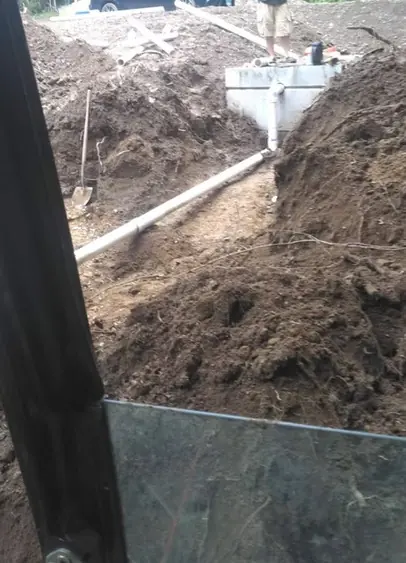 Septic tank and distribution box installation with open trench dug by Landmark Enterprises in Dewittville, NY